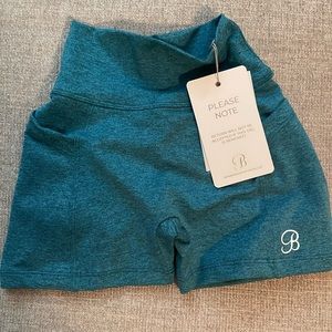 Never worn before bombshell but scrunch shorts.